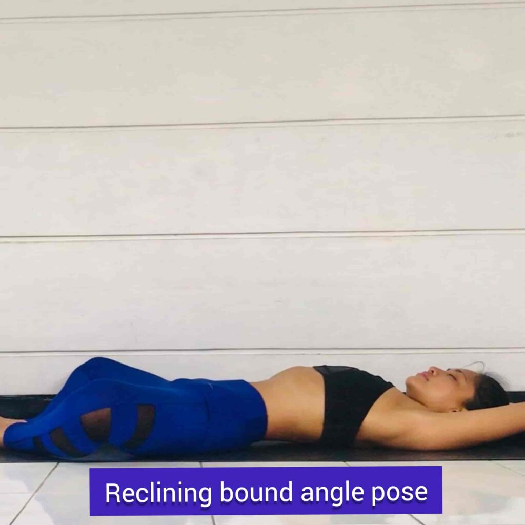 Reclining bound angle pose for stress relief yoga - sharpmuscle